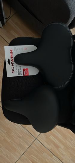 Two Schwinn bike seat