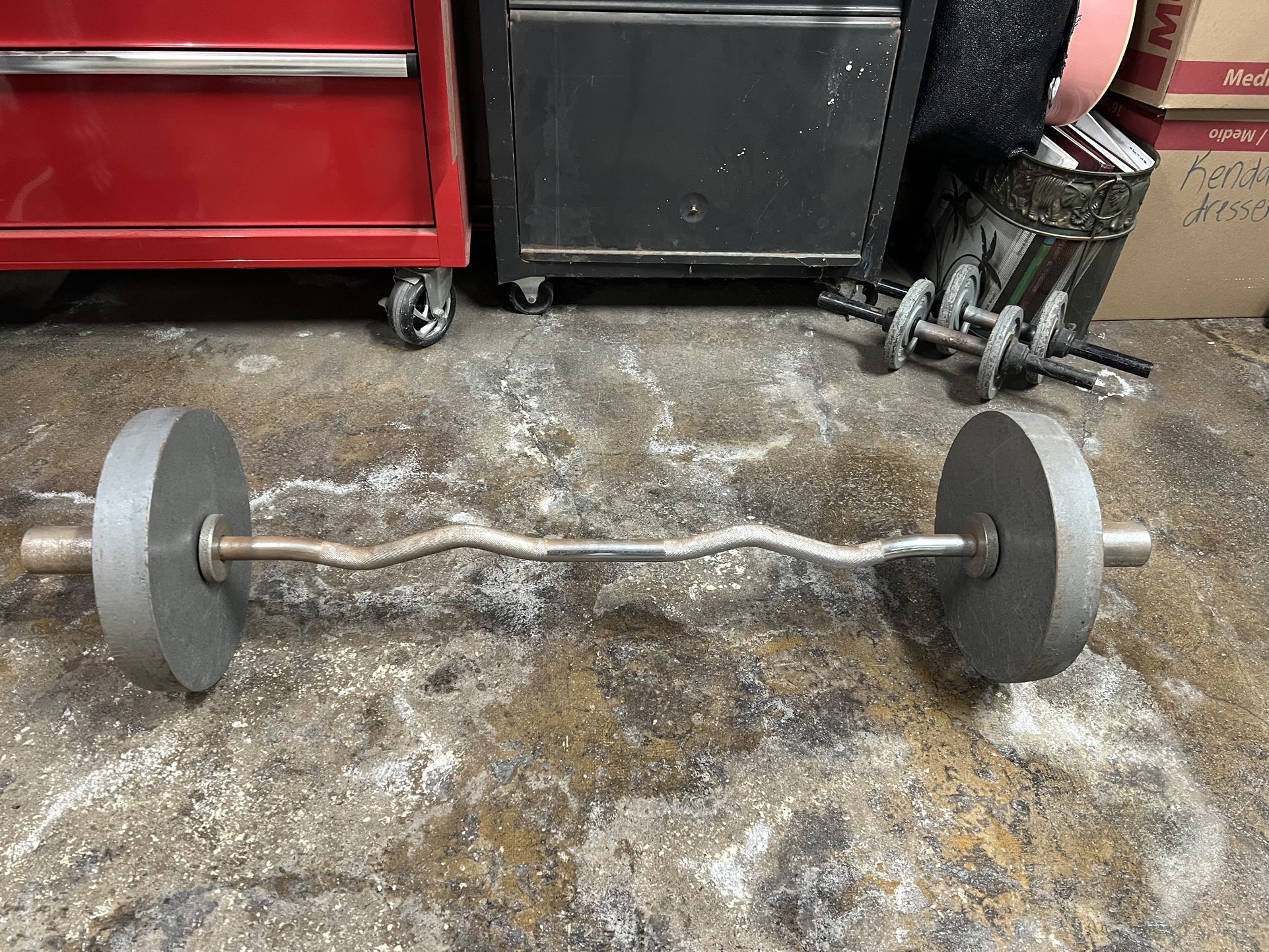 Olympic Curl Bar And Two 25 Pound Plates