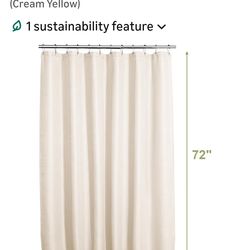 Two cream yellow shower curtains