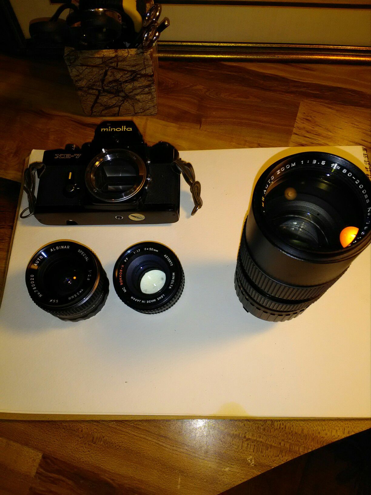 Vintage Minolta 35 mm camera with 3 lenses