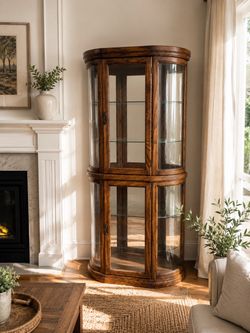 Solid wood curio cabinet with curved glass sides