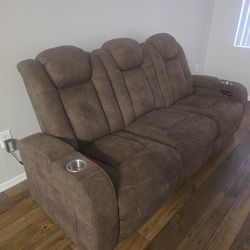 Brand New Never Been Use Sofa Recliner /with The  Center Reading Light
