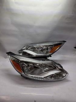 12-14 FORD FOCUS chrome amber pair of headlights