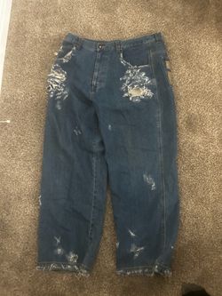 Heavily Distressed Baggy Blue Jeans