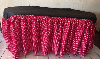 Red Minnie Mouse polka dots table cover only cover the front and sides for a regular party table