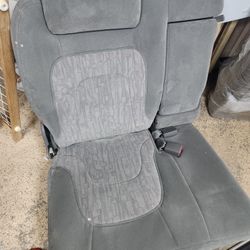 USED SET OF BACK SEATS FOR A 2003 BUICK RENDEZVOUS  SEATS ARE CLOTH IN GOOD CONDITION 