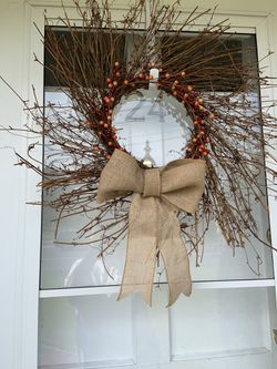 24 inch berry wreath with or without burlap bow.