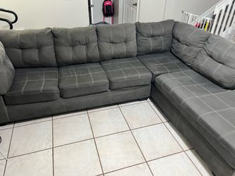 Sectional Couch , Ashley Furniture dark gray 2-piece sectional with a chaise