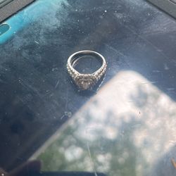 10 k white gold size 7 paid 1200 or 1300 real diamonds 