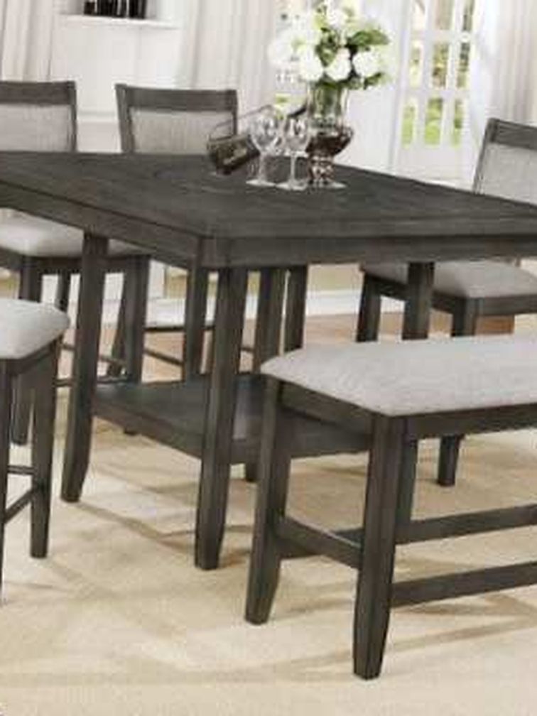 6 Pcs counter height dining table. Price firm. 2