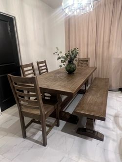 Living Spaces solid wood well made dining table , bench & 4 chairs