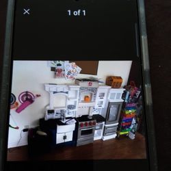 Kids Kitchen With Lots Of Bins Of Accessories 