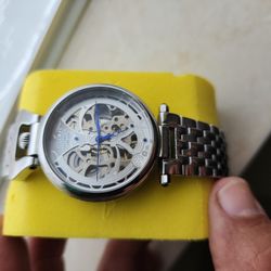 Invicta watch unisex.  I like that its not a huge sized 