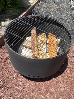 Steel Fire Pit with wood and top grill