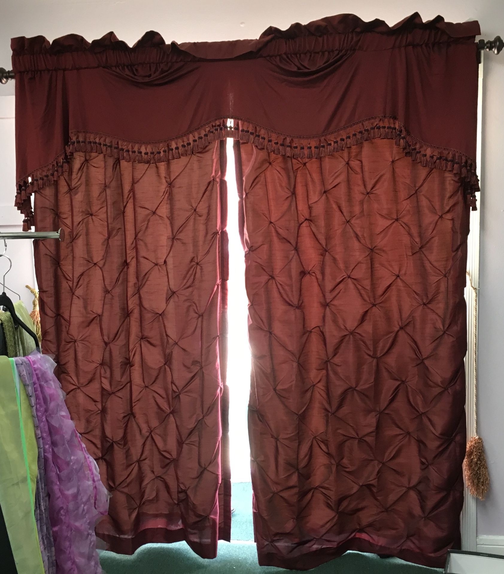 Draperies with burnished drapery rods fully lined very new
