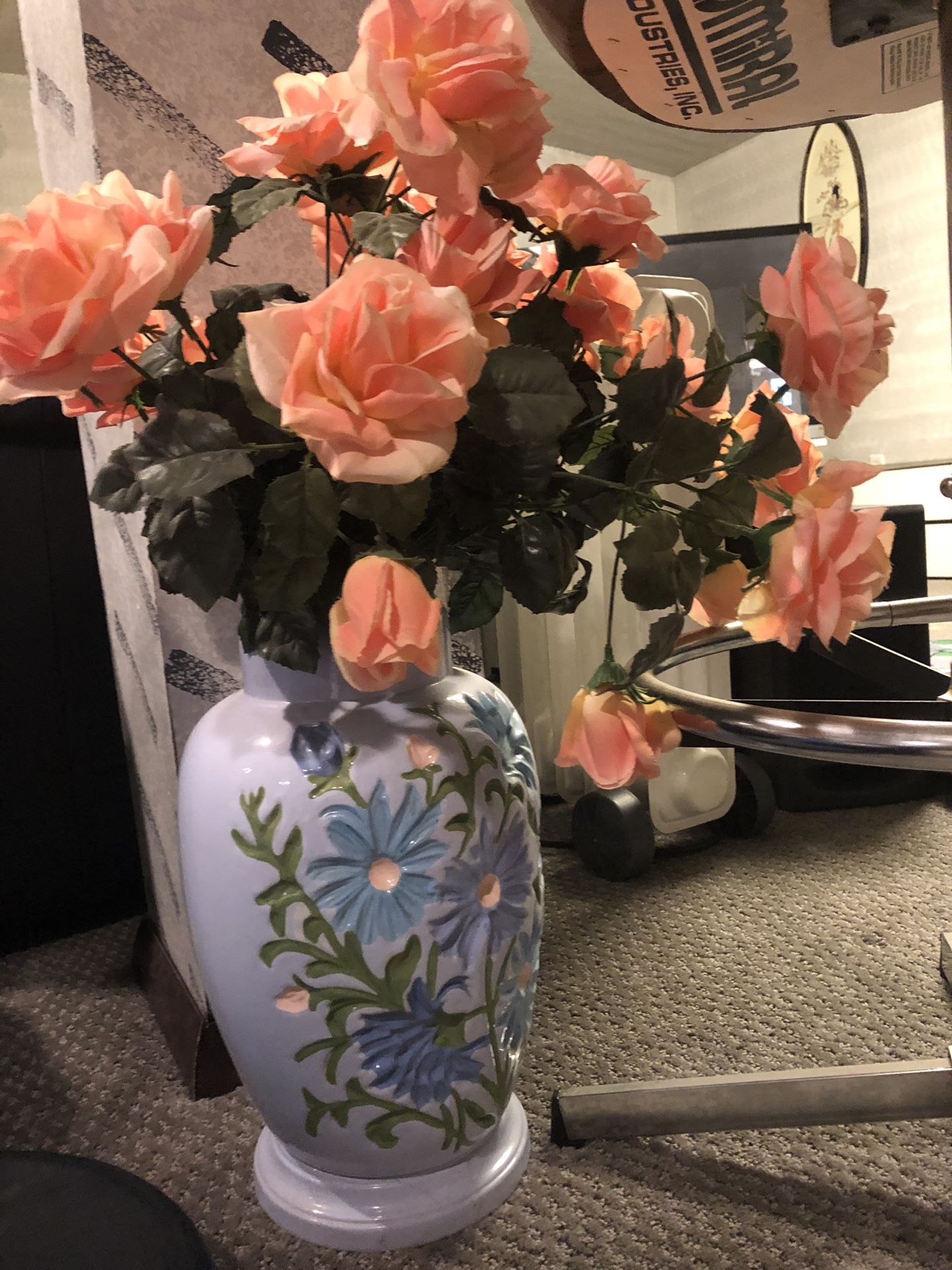 Vase with artificial flowers