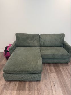 Small light forest green sofa, reversible