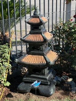 Pagoda lantern Japanese style ( made of concrete and 41”high)$200.cash