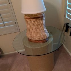 2 Round Glass Tables Each With A Lamp