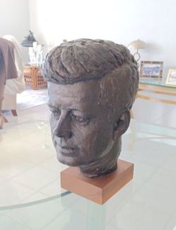 Austin productions Kennedy bust on wood stand 1964