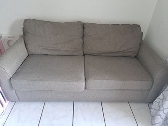 Gray Fabric Two-Seat Sofa. Sofa cama y uno de 2 piezas