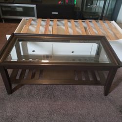 Ashley Walnut Coffee Table 50 W. 20 H. 20 D.