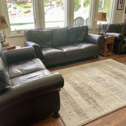 leather couch set  . Couch, love seat and captains chair. 