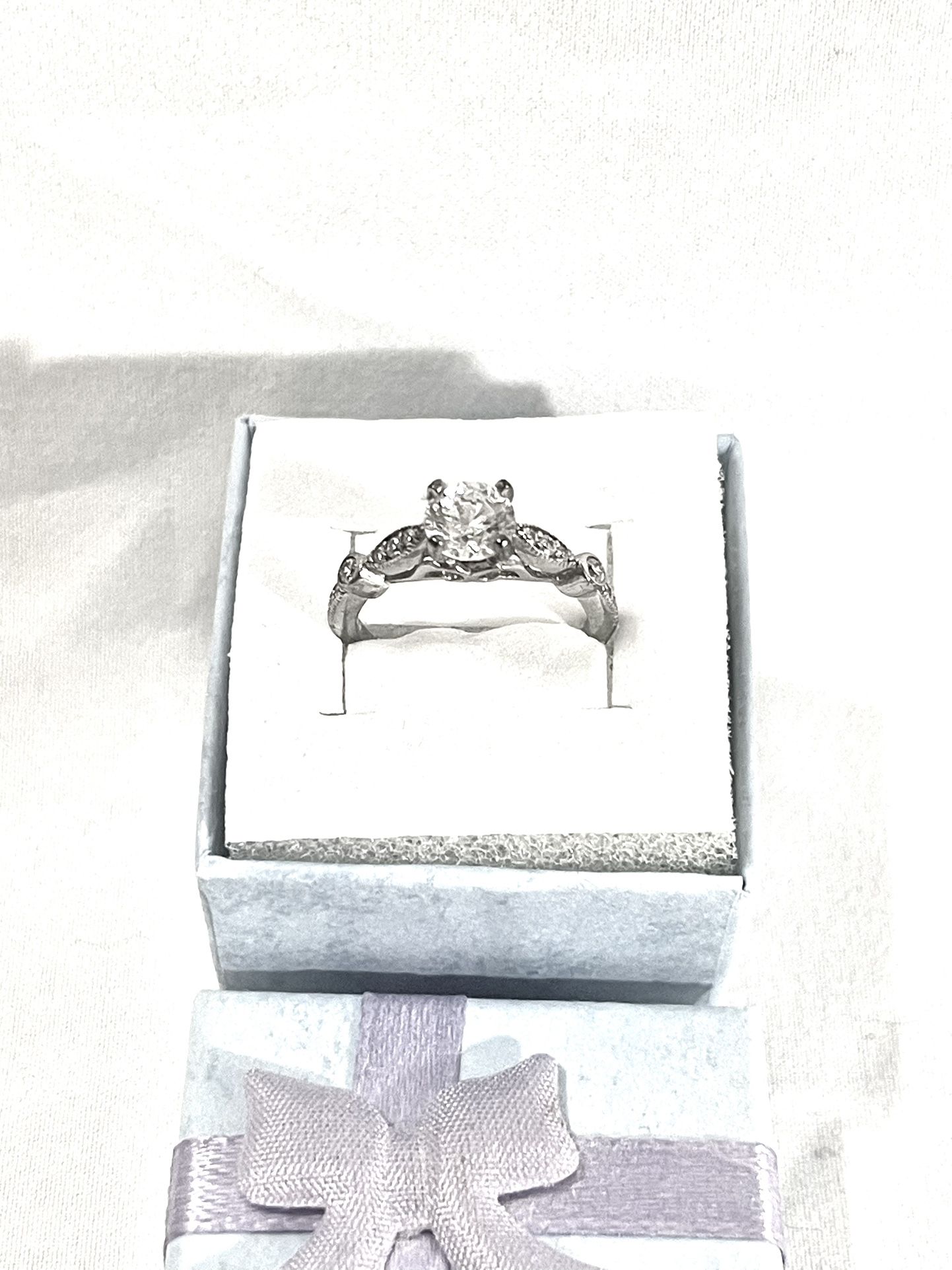 Brand New Cubic Zirconia CZ Diamonds Set In A Sterling Silver Wedding Ring. Size 5.