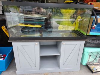 75 gallon tank, stand glass lids, led light, gravel and fx4 fluval canister filter!