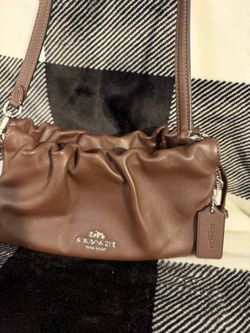 Dark brown leather handbag