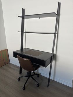 Wall mounted desk w/chair.