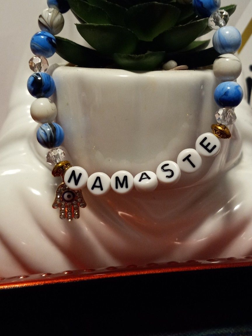 Elastic Namaste Bracelet With Gold Hamsa Hand Evil Eye Charm