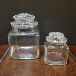 2 Vintage Clear Glass Jars with 8 Point Starburst Lids