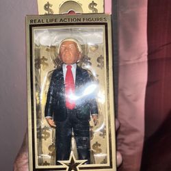 Trump action figure new 100