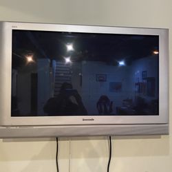 Panasonic 42 Inch TV With Wall Rack