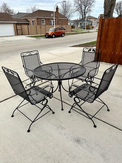 Wrought Iron Patio Set, 48” Table With 4 Bouncy Chairs, Great Cond. Local Delivery Available For Extra Cost