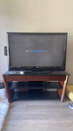 Tv and stand (local pickups only no shipping or deliveries)