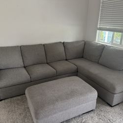 Living Spaces Grey Chaise Sofa