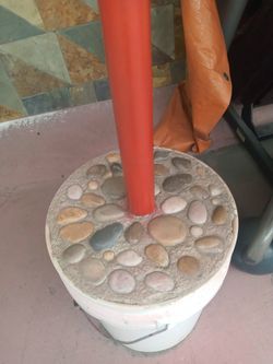 $50.00 Umbrella holder Concrete stones