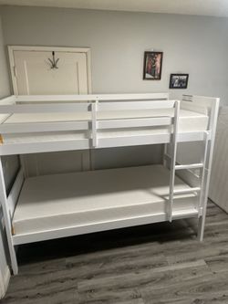 Twin over twin bunk bed. White or espresso. Assembly required. Assembly not included. Taxes included. Free delivery.  Bunk Bed only without Assembly-$