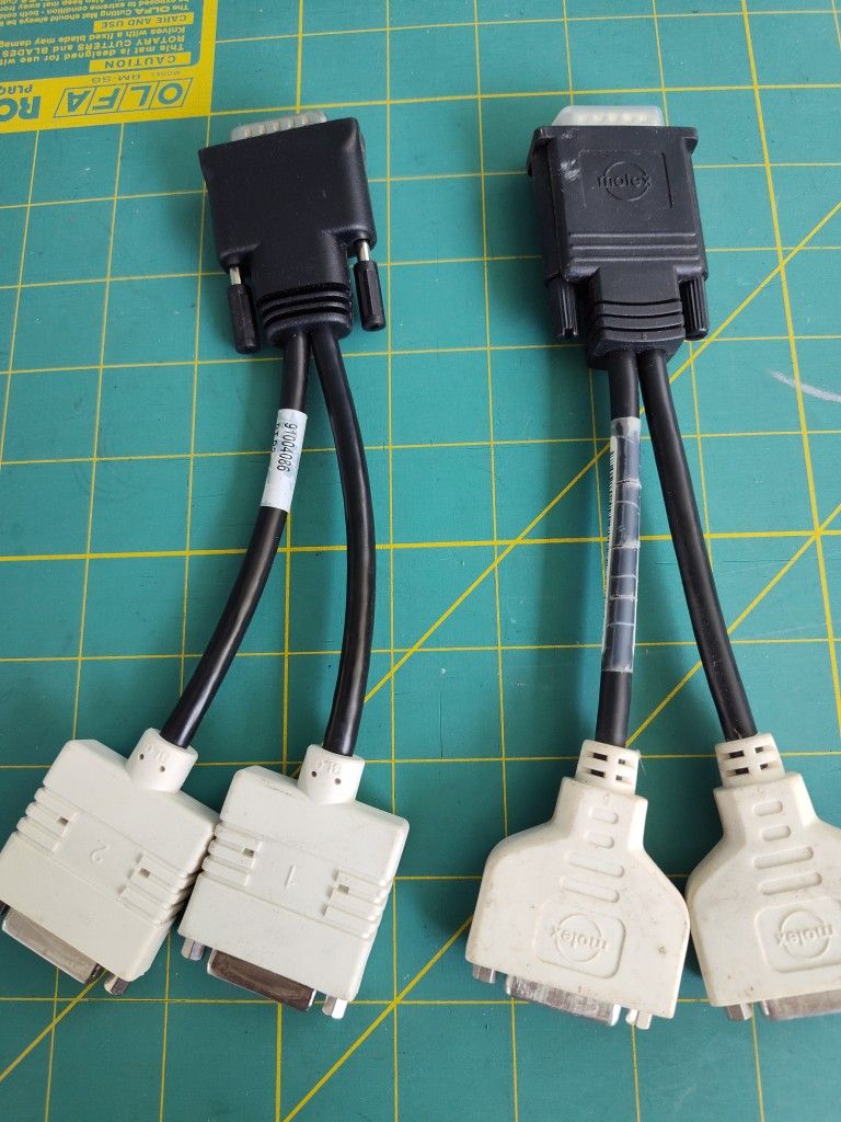 $20 firm, 59 pin to dual DVI cable pair, work, for old gaming PCs.  Set up four display monitors 