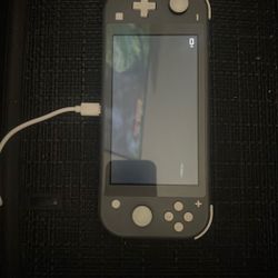Nintendo Switch Lite  + Extras