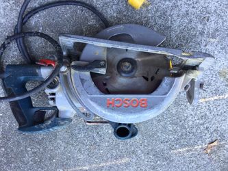 BOSCH 15 Amp 7-1/4 in. Corded Magnesium Worm Drive Circular Saw with Carbide Blade