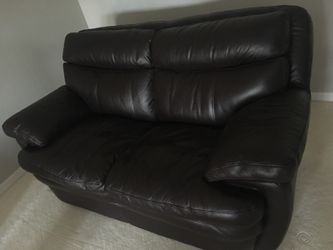 Plush very nice leather loveseat