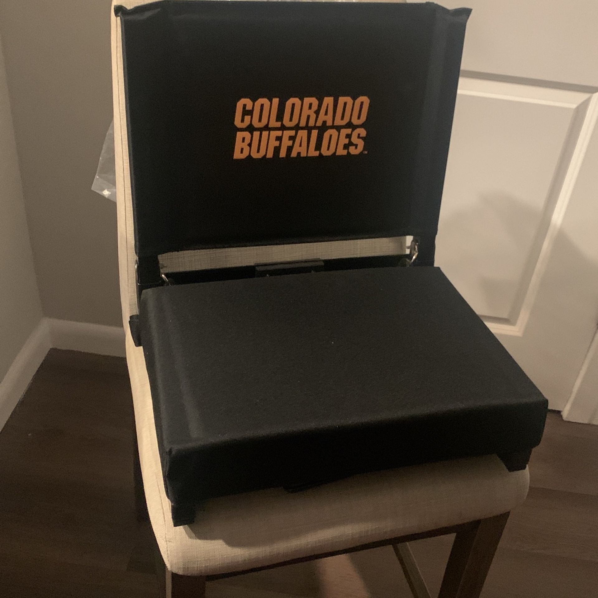 Support your team in comfort with the University of Colorado Portable Stadium Seat!