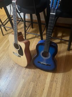 2 Beginner Acoustic Guitars - Natural & Blue - One Needs Strings  $50 for both