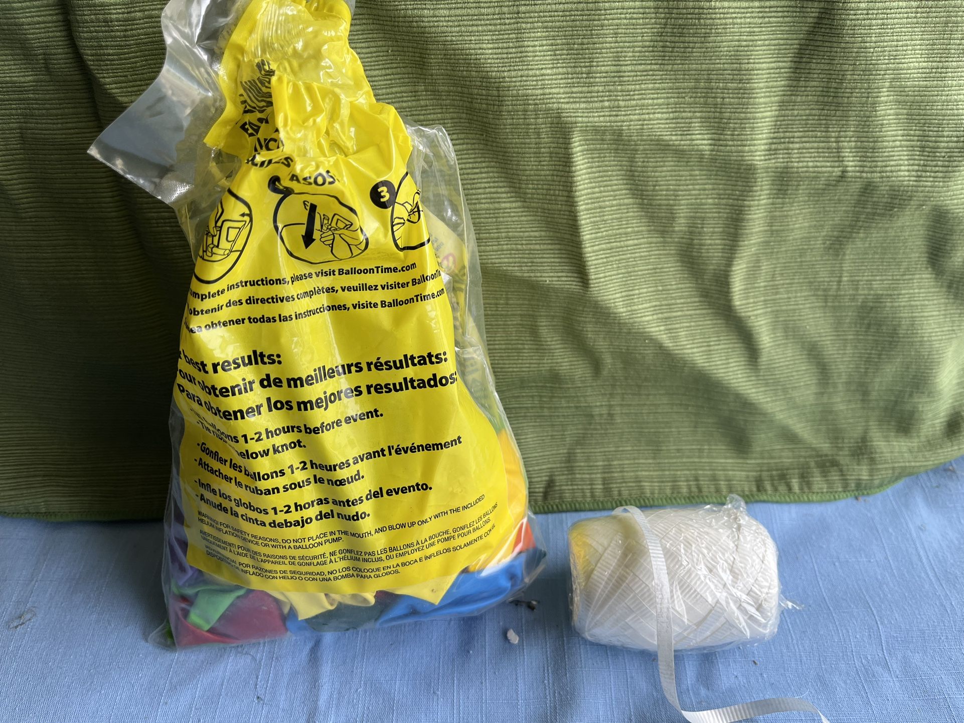 Open pack Of Balloons With String