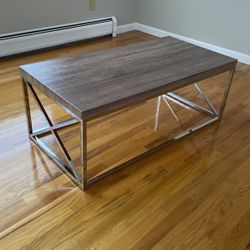Chrome and faux wood coffee table