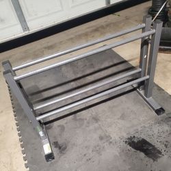 Dumbell Rack holds up to 450lbs
Base  is 19" Deep x 34.5" Wide. Below Retail Price