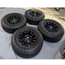 17x9 Fuel Vapor D560 Black Wheels Falken AT Tires 6x135 Ford F150 Expedition